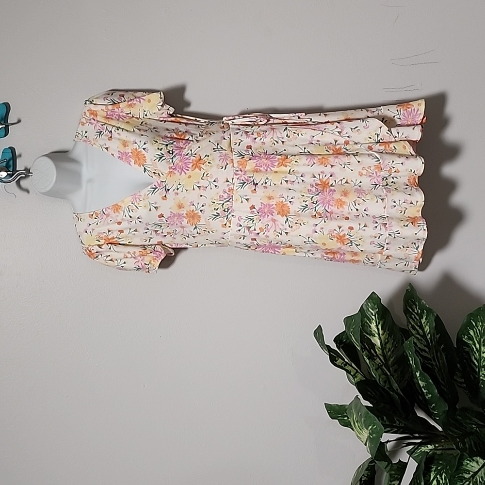 No boundaries size 11/13wrap dress. Beautiful summer floral print. NWOT